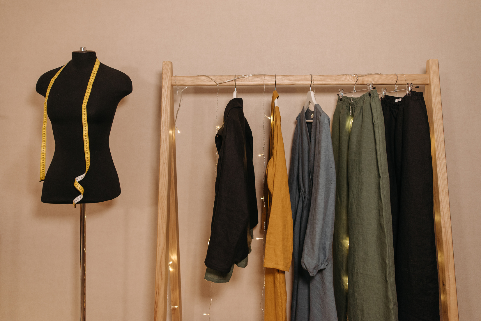 Hanging Clothes on Wooden Rack